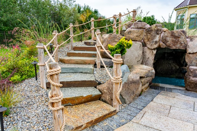 Bruar D - Millstone, NJ - A set of stone stairs leading up to a rock cave with rope barriers
