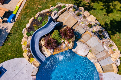 Augrabies C - West Deptford, NJ - A backyard with a pool and a water feature, viewed from above