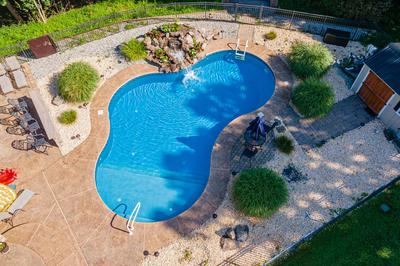Azure G - Hillsborough, NJ - A bird's eye view of a backyard with a swimming pool surrounded by landscaping