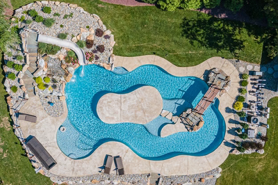 Bagley U - Williamstown, NJ - A bird's eye view of a backyard with a swimming pool and a water feature