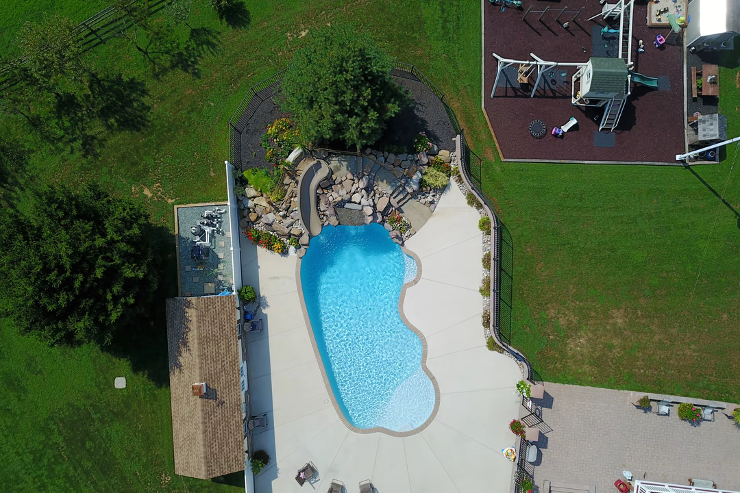 Bauguess F - Colora, MD - A bird's eye view of a backyard with a swimming pool and a play area