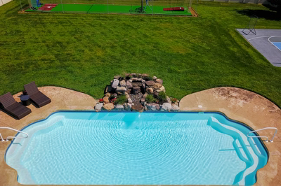 Beach F - Lumberton, NJ - A backyard with a swimming pool and a basketball court.