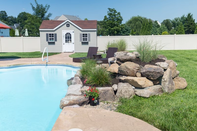 Beach G - Lumberton, NJ - A backyard with a pool and a small house in the background
