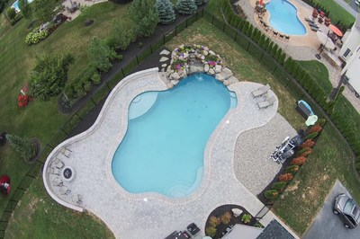 Bearcamp E - Mechanicsburg, PA - A bird's eye view of a backyard with a swimming pool surrounded by landscaping