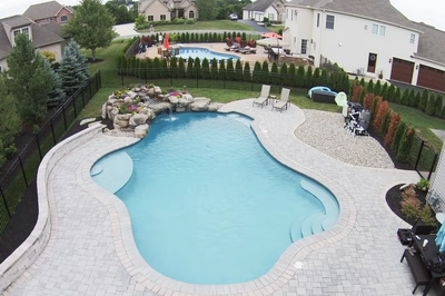 Bearcamp F - Mechanicsburg, PA - A large backyard with a swimming pool surrounded by a black fence.