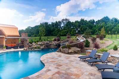 Bridge J - Lewisburg, PA - A large backyard with a swimming pool and a water feature.