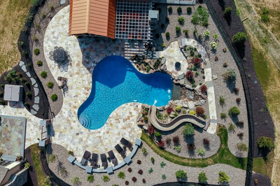 Bridge L - Lewisburg, PA - A bird's eye view of a backyard with a swimming pool surrounded by landscaping