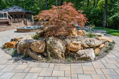 Castor F - Fallston, MD - A large rock garden with a small tree in the middle of it