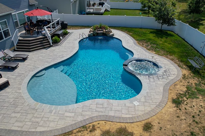 Cliff I - Bel Aire, MD - A backyard with a swimming pool and patio area.