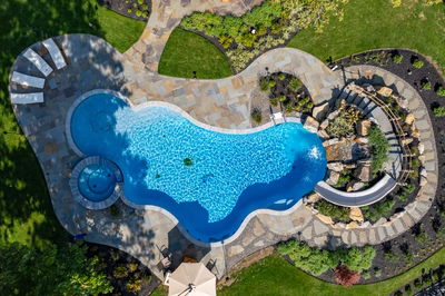 Gikira N - Bethlehem, PA - A bird's eye view of a swimming pool surrounded by landscaping
