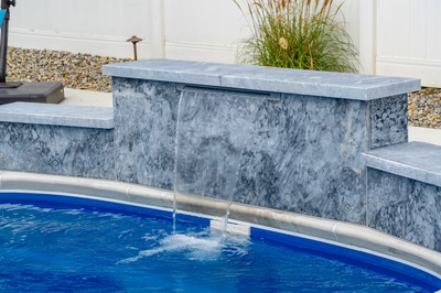 Haifoss G - Sicklerville, NJ - A pool with a waterfall feature in the middle of it