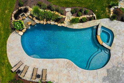 Jodo H - Medford, NJ - A bird's eye view of a swimming pool surrounded by landscaping