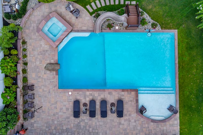 Lamberson N - Mount Laurel, NJ - A bird's eye view of a backyard with a swimming pool and patio area