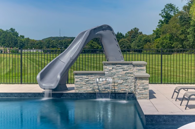 Mossbrae C - Millstone, NJ - A pool with a water feature and a slide in the middle of it
