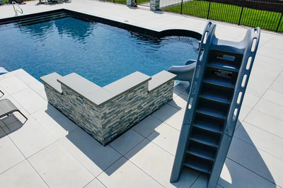 Mossbrae G - Millstone, NJ - A swimming pool with a ladder and lounge chairs next to it