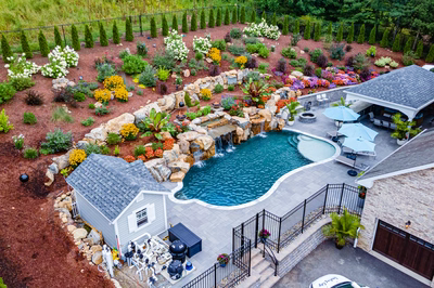 Munising R - Randolph, NJ - A bird's eye view of a backyard with a swimming pool surrounded by landscaping