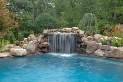 Prenn J - Limerick, PA - A pool with a waterfall in the middle surrounded by lush greenery