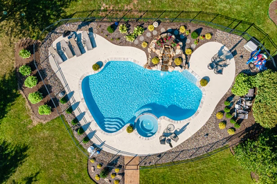 Ryuzu J - Collegeville, PA - A bird's eye view of a backyard with a swimming pool surrounded by landscaping