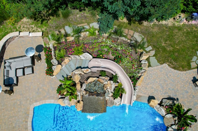 Toketee E - Galloway, NJ - A bird's eye view of a backyard with a swimming pool and a water feature