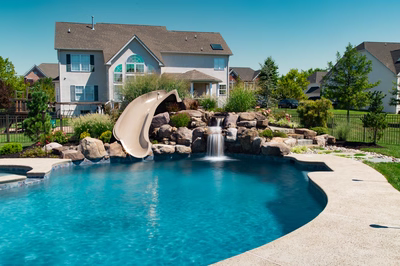Natural stone pool water feature with a slide, Shamong, NJ