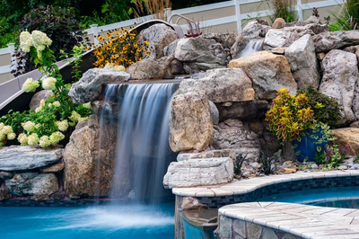 Yosemite C - Newtown Square, PA - A beautiful backyard with a waterfall and landscaping around it
