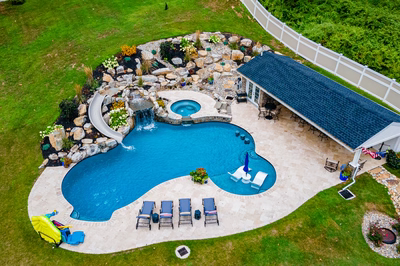 Yosemite Q - Newtown Square, PA - A bird's eye view of a backyard with a swimming pool and a waterfall.