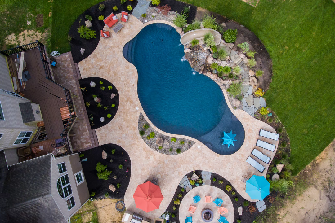 Belden G - Williamstown, NJ - A bird's eye view of a backyard with a swimming pool surrounded by landscaping